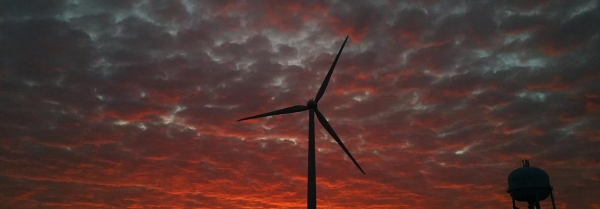 Wind turbine on Seneca Land with sunset