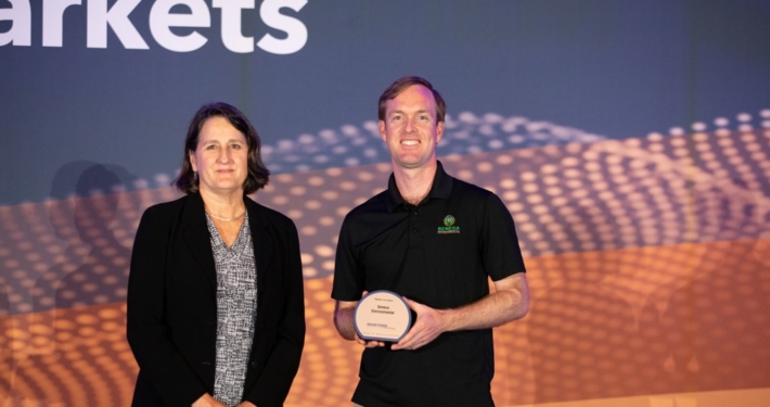 Whitner Chase on stage at the Green Power Leadership Awards on September 2, 2026 accepting the award on behalf of Seneca Environmental Solutions.